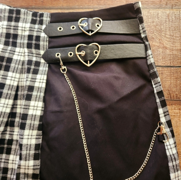 Romwe small skirt. Never worn/has tags still on. Decorative belts. - Picture 2 of 3